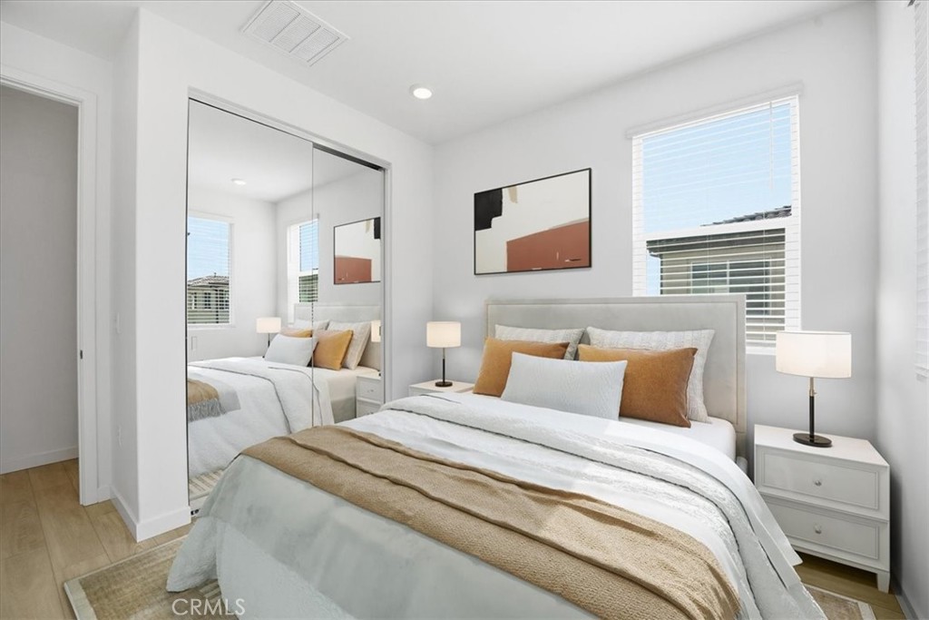 9324 Via Azul Pico Rivera, CA 90660 - Photo 18 of 33 a bedroom with bed and night stand