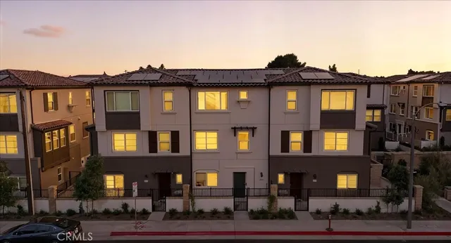 a front view of residential houses
