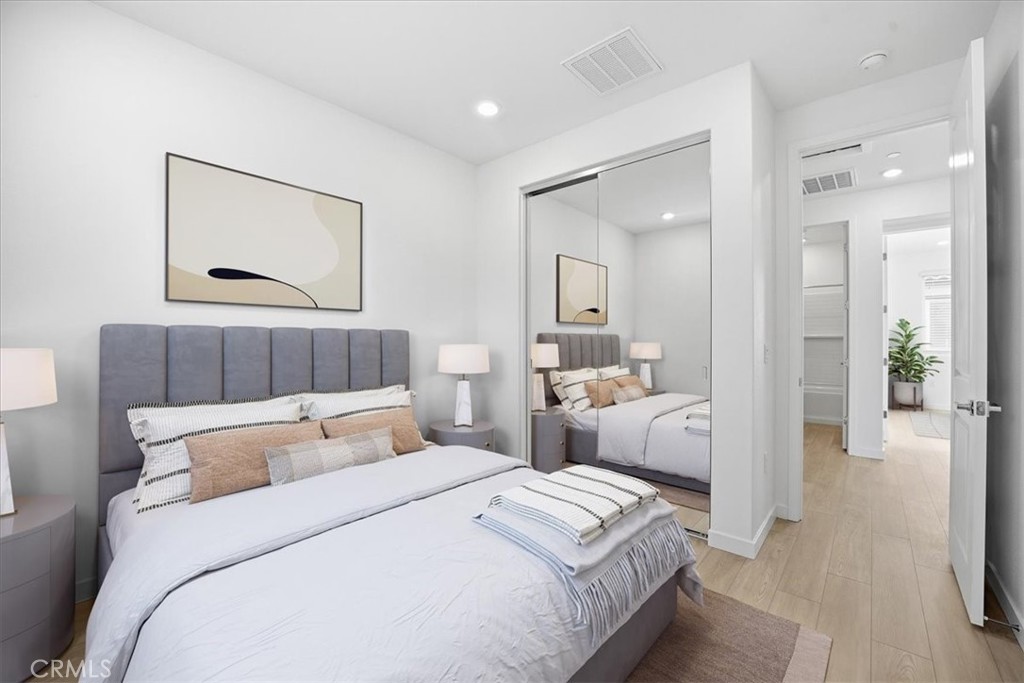 9324 Via Azul Pico Rivera, CA 90660 - Photo 22 of 33 a bedroom with a bed and a couch