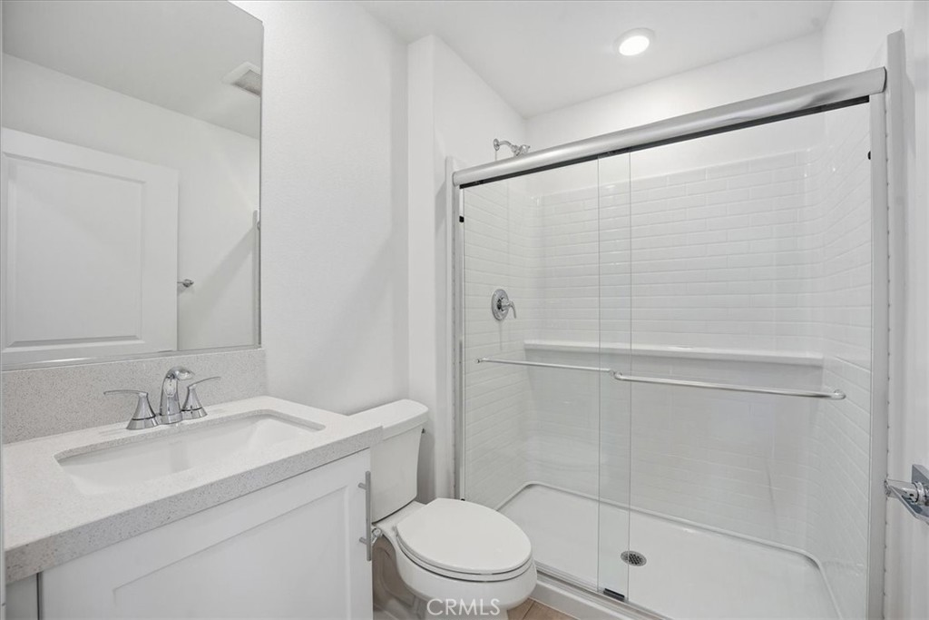 9324 Via Azul Pico Rivera, CA 90660 - Photo 23 of 33 a bathroom with a sink toilet and shower