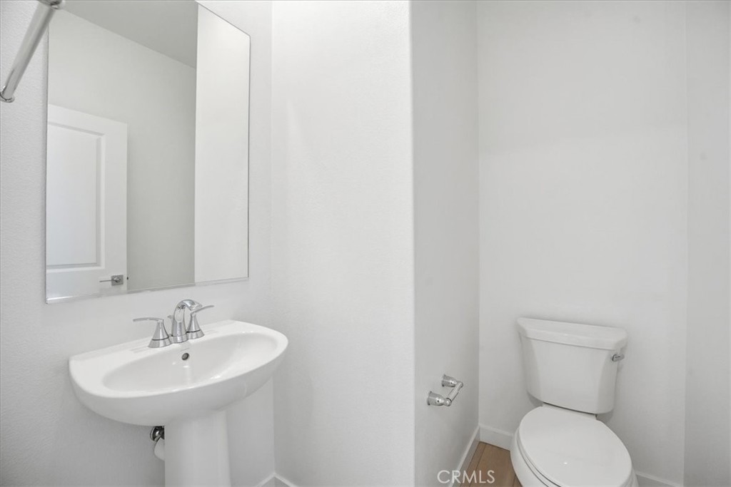 9324 Via Azul Pico Rivera, CA 90660 - Photo 27 of 33 a bathroom with a sink and a toilet