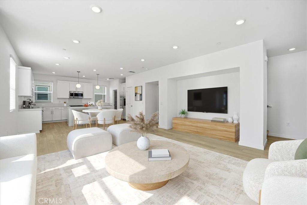9324 Via Azul Pico Rivera, CA 90660 - Photo 4 of 33 a living room with furniture and a flat screen tv