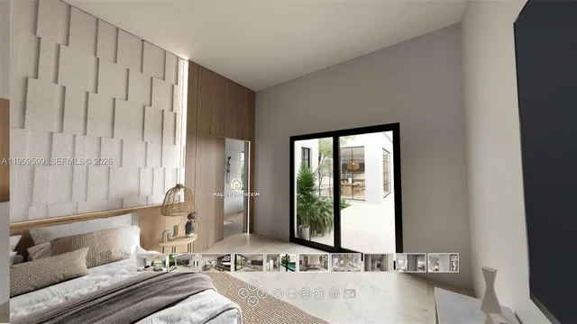 a living room with furniture and large windows