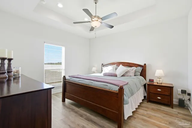 a kitchen with a sink stove top oven and refrigerator