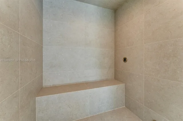 a view of an empty room with a balcony