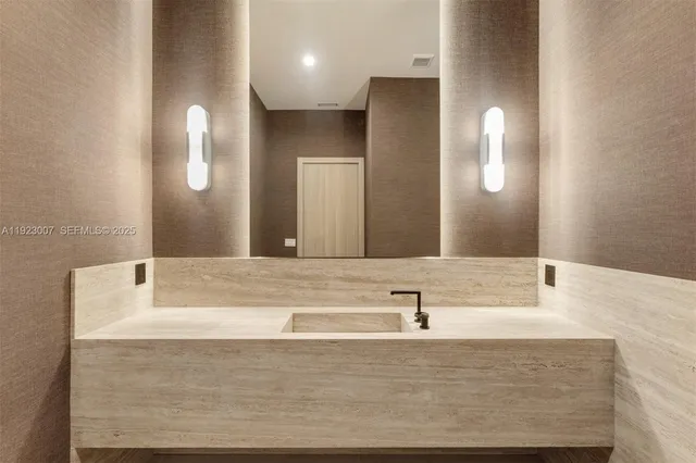 a view of a hallway with windows