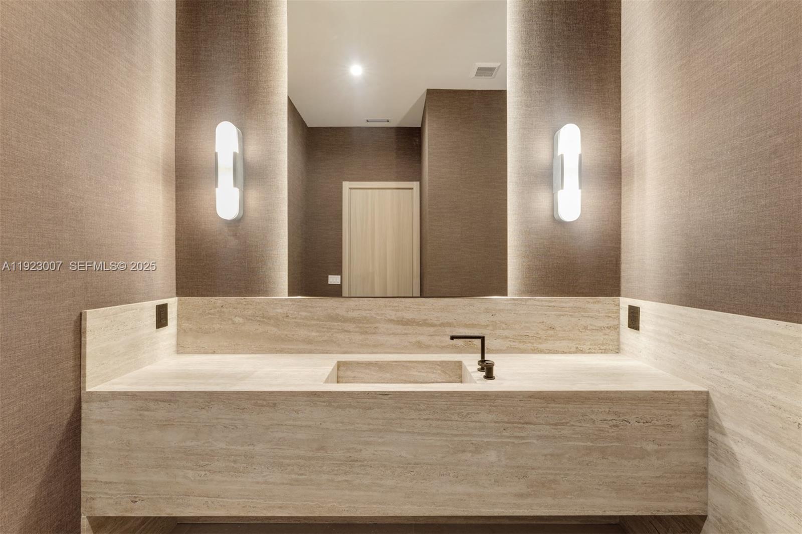 6840 Southwest 92nd Street Pinecrest, FL 33156 - Photo 16 of 42 a bathroom with a bathtub and a sink