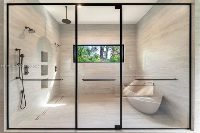 a view of an empty room with a cabinet