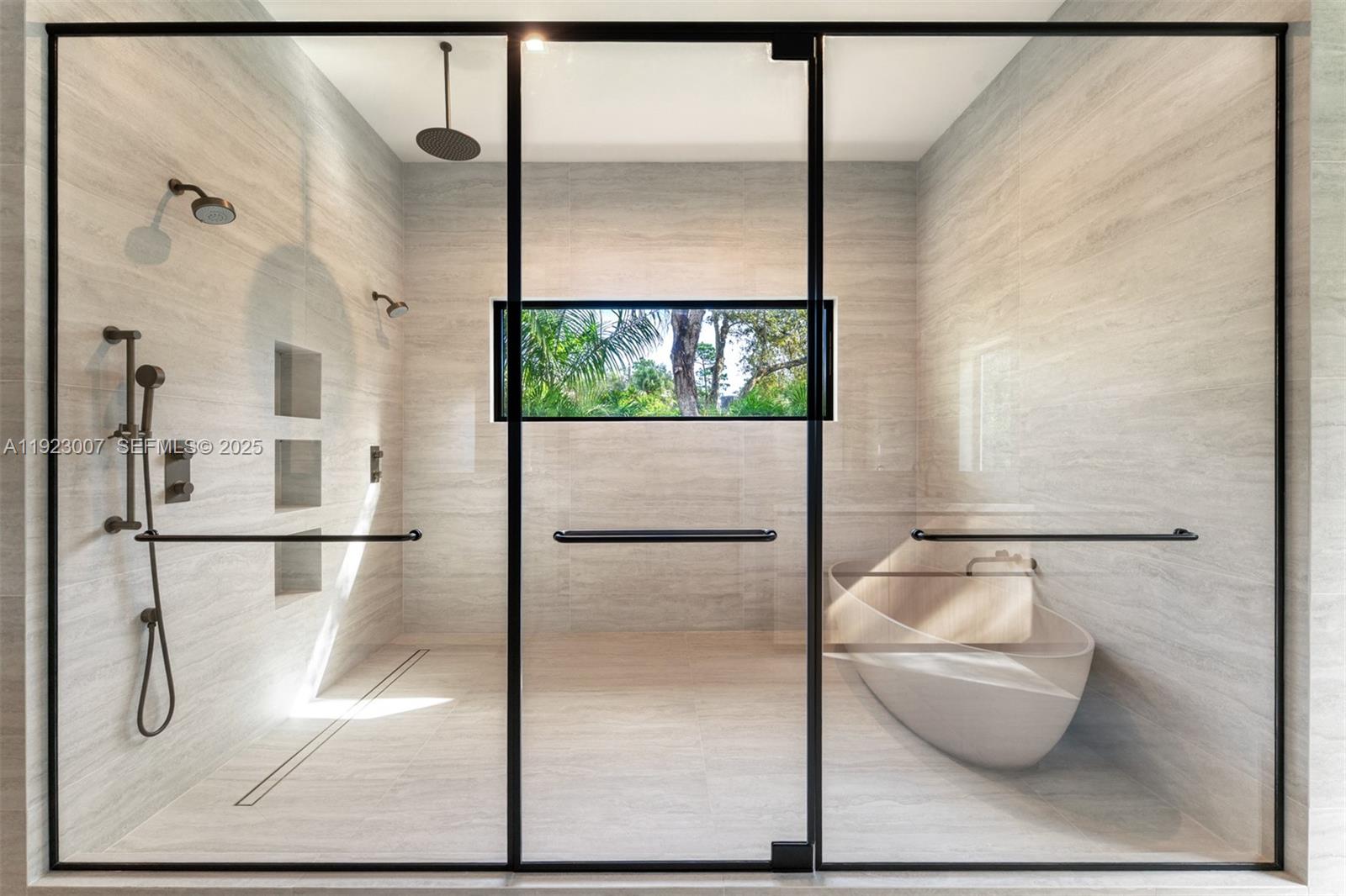 6840 Southwest 92nd Street Pinecrest, FL 33156 - Photo 20 of 42 a bathroom with a shower