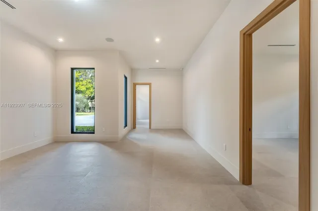 an empty room with windows