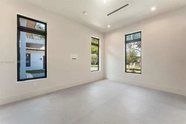 a bathroom with a sink and a large mirror