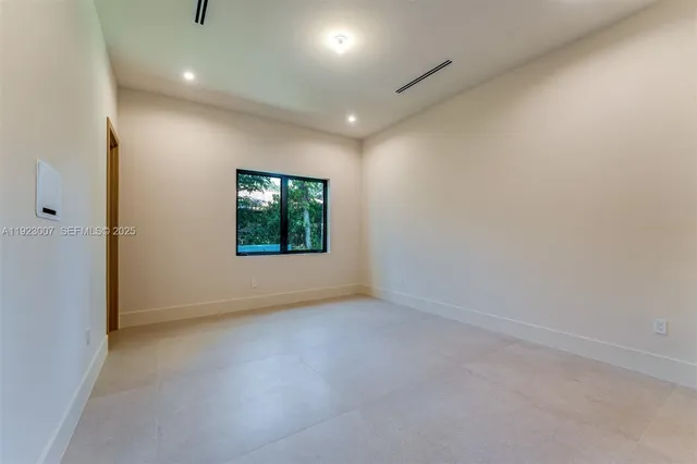 a bathroom with a bathtub and a sink
