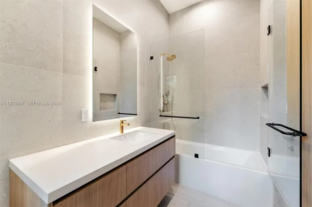 a view of a storage & utility room with a washer dryer