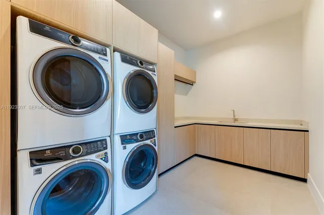 a view of a livingroom with window and wooden floor