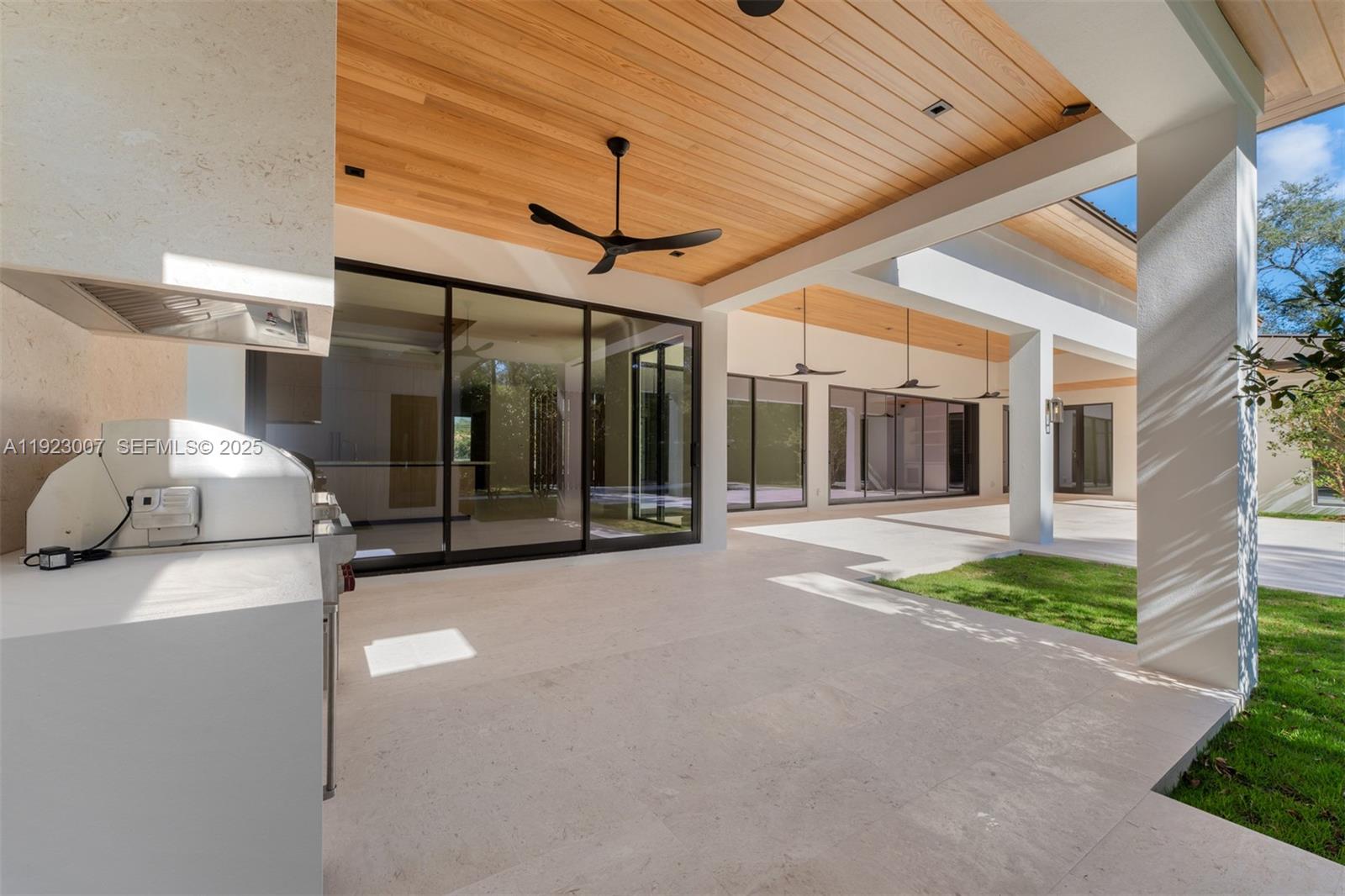 6840 Southwest 92nd Street Pinecrest, FL 33156 - Photo 35 of 42 a view of a porch with seating space