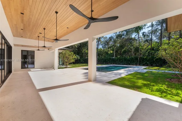 a view of a house with swimming pool