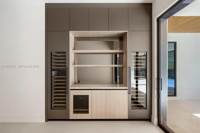 a room with closet and a glass door