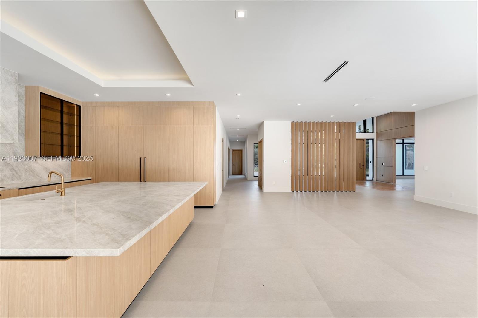 6840 Southwest 92nd Street Pinecrest, FL 33156 - Photo 9 of 42 a view of an empty room with kitchen