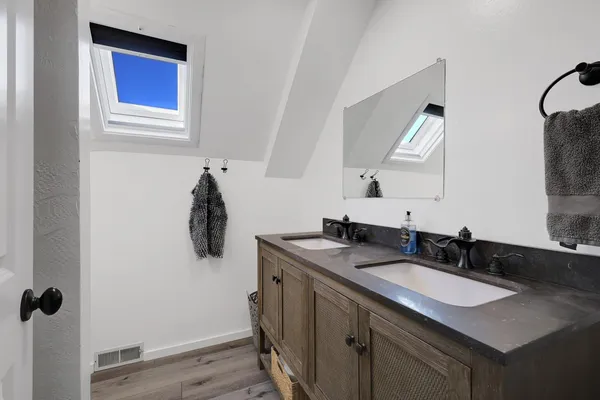 a view of a house with a yard and garage