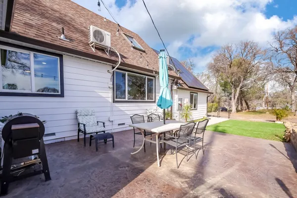 a bedroom with a bed and cabinets