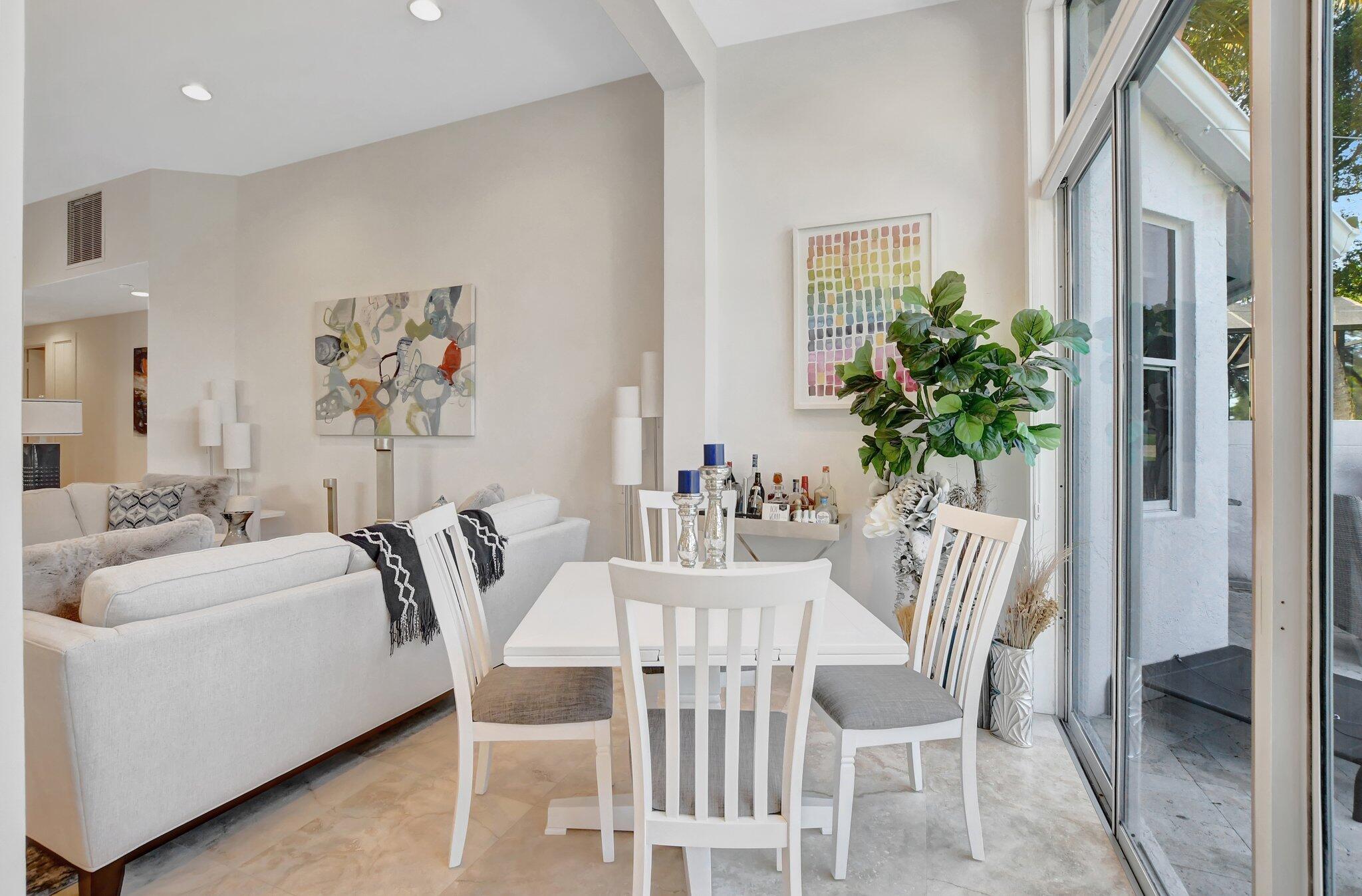 2273 Northwest 53rd Street Boca Raton, FL 33496 - Photo 27 of 50 Living room card/dining table