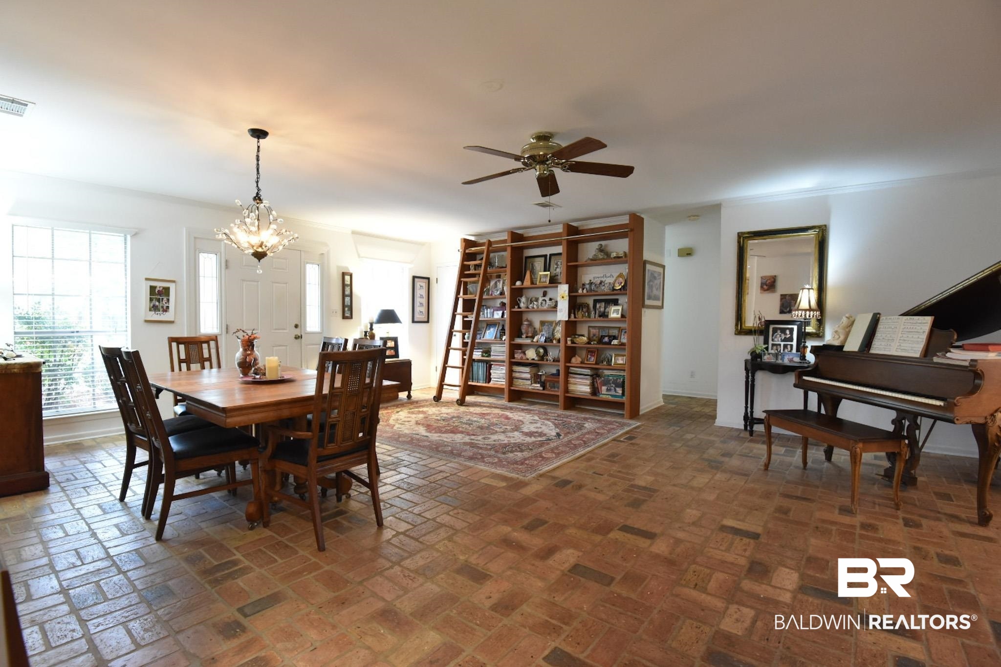 90 Paddock Drive Fairhope, AL 36532 - Photo 7 of 23 Dining room with brick flooring, ceiling fan, a chandelier, and ornamental molding
