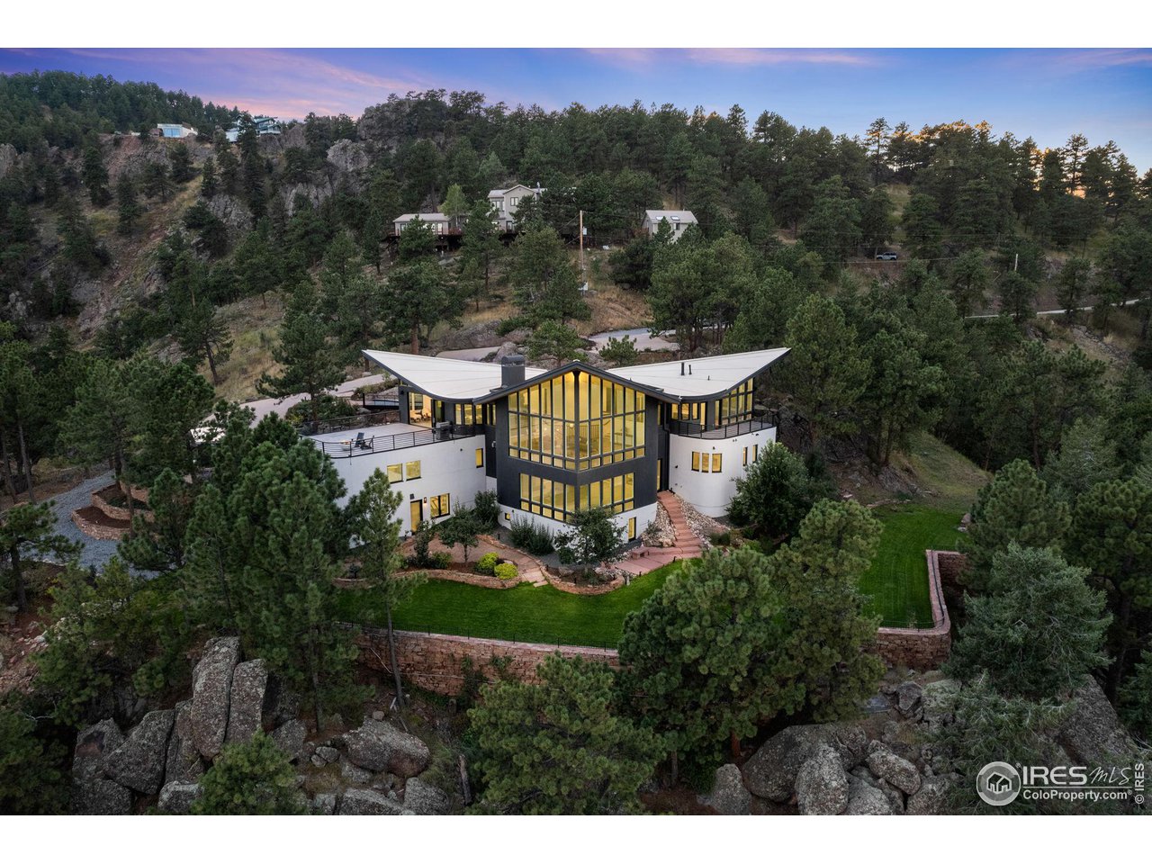 855 Timber Lane Boulder, CO 80304 - Photo 2 of 40 a view of a house with a yard and sitting area