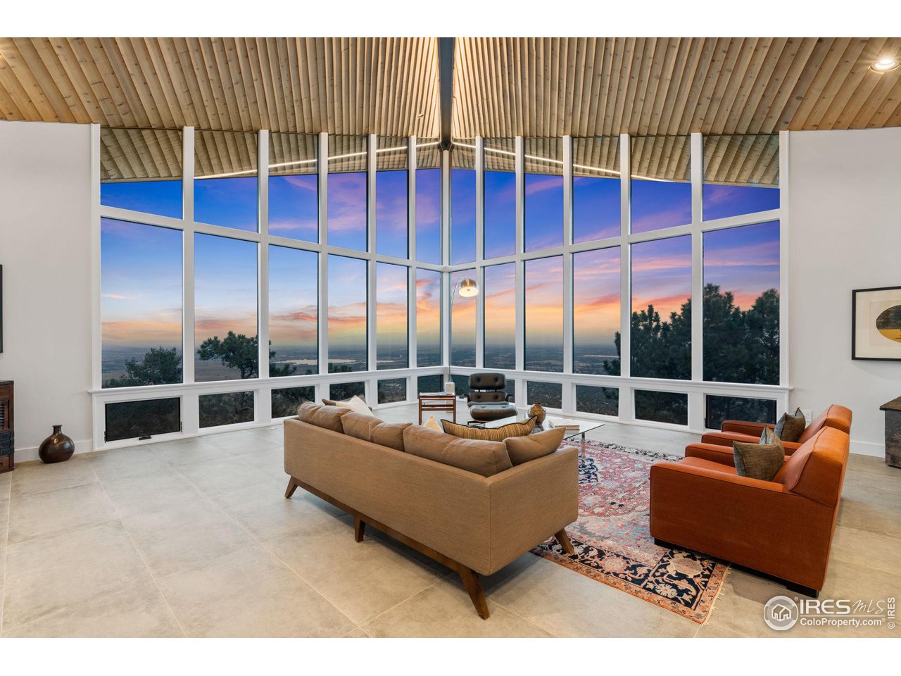 855 Timber Lane Boulder, CO 80304 - Photo 7 of 40 a living room with furniture ceiling fan and a floor to ceiling window