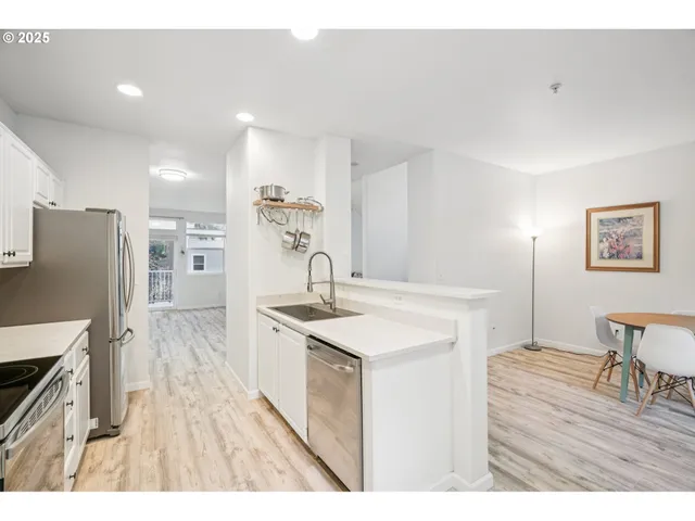 a bathroom with a sink mirror and vanity