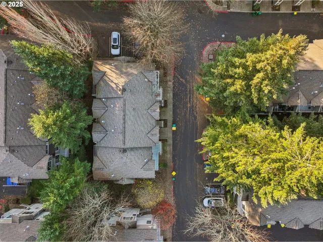 an aerial view of a house with yard swimming pool and outdoor seating