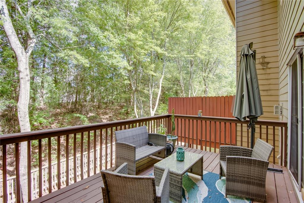 2799 Keystone Avenue Lithonia, GA 30058 - Photo 19 of 41 a view of a chair and table in the balcony
