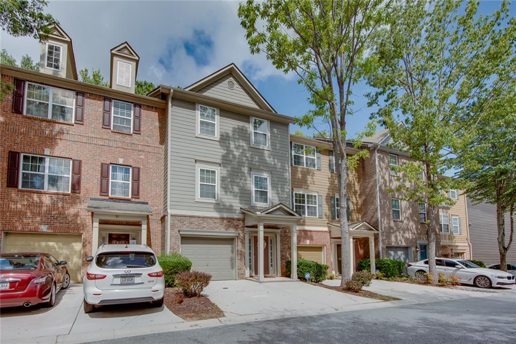 2799 Keystone Avenue Lithonia, GA 30058 - Photo 2 of 41 a car parked in front of a building