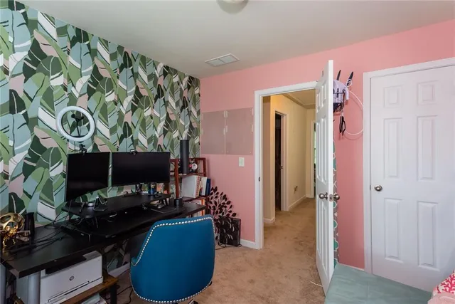 a living room with a couch and a flat screen tv