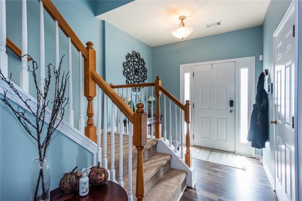2799 Keystone Avenue Lithonia, GA 30058 - Photo 6 of 41 a view of entryway with wooden floor and stairs