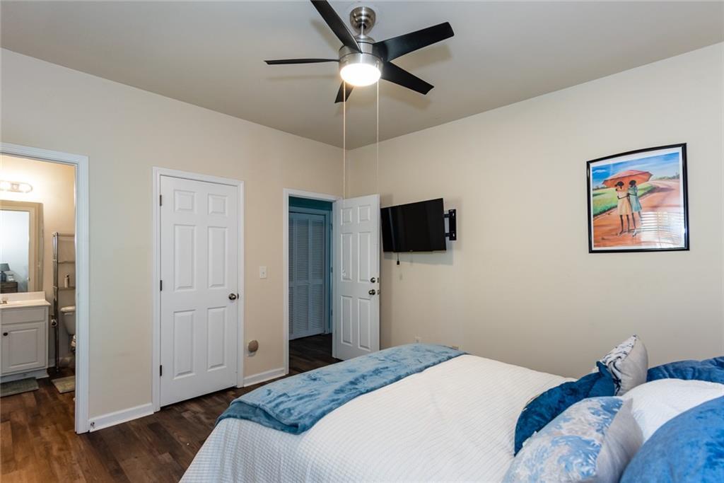 2799 Keystone Avenue Lithonia, GA 30058 - Photo 9 of 41 a bedroom with a bed and a tv