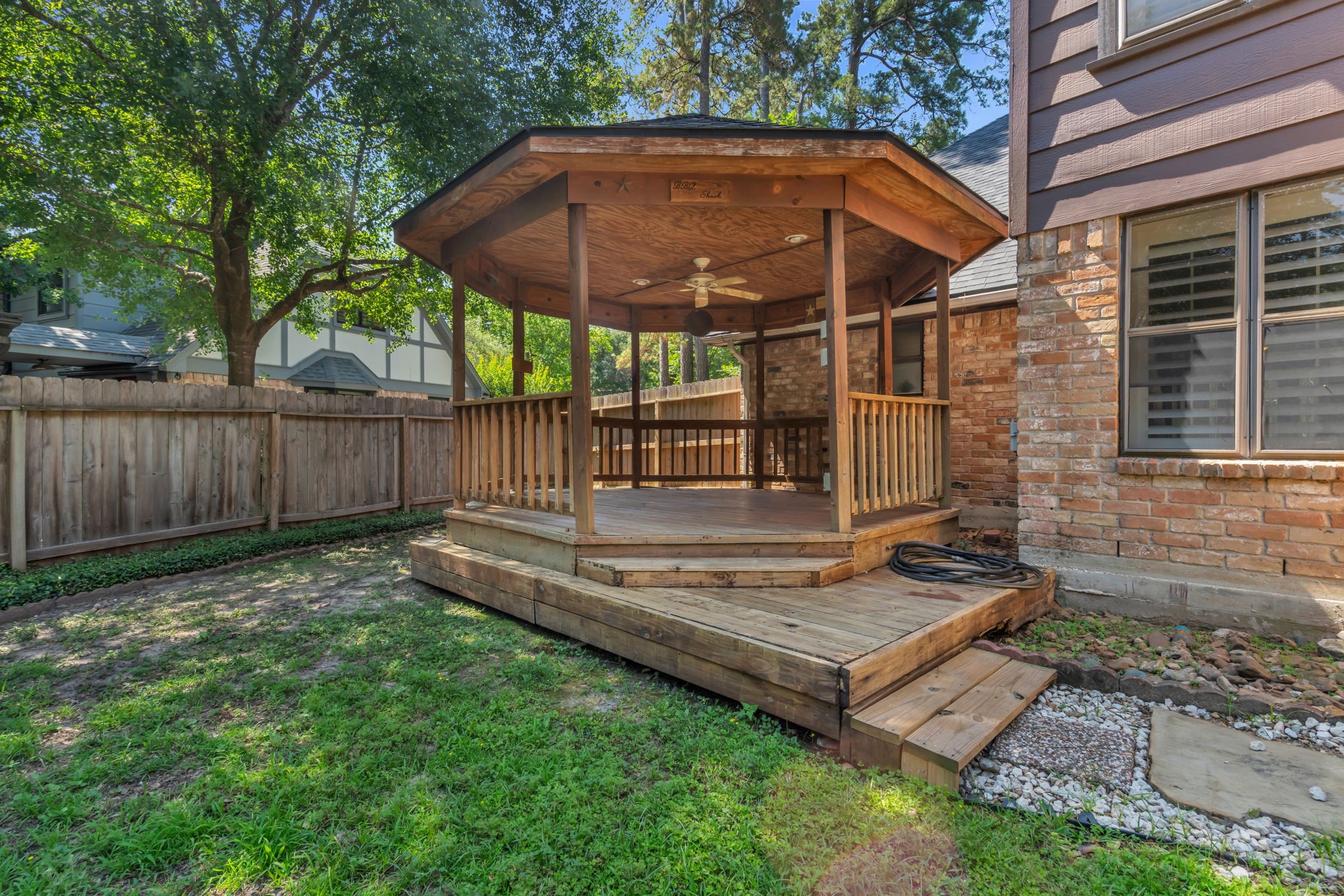 6514 Larkmount Drive Spring, TX 77389 - Photo 36 of 41 A backyard gazebo creates a welcoming setting for cookouts!