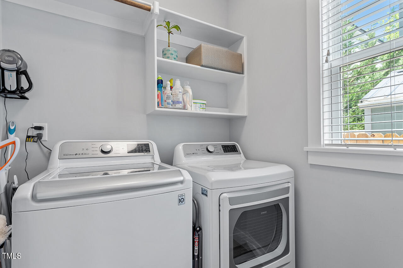 702 Coleman Street Raleigh, NC 27610 - Photo 19 of 37 Downstairs laundry w/ daylight window