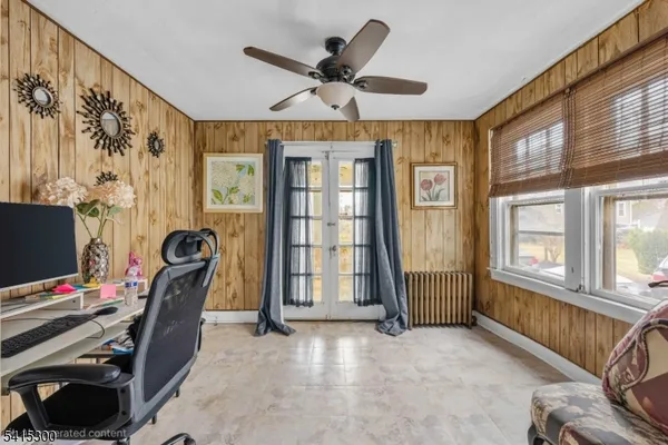 a workspace with furniture and window