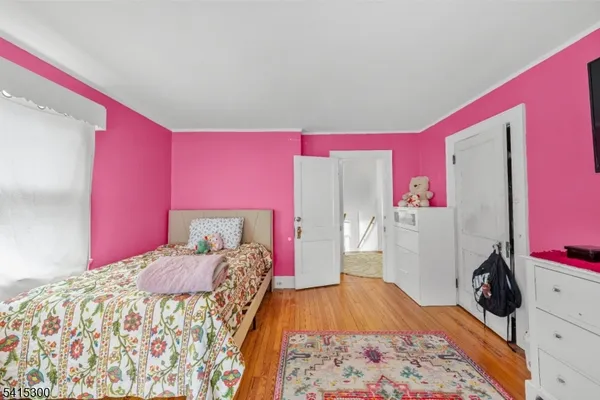 a bed room with a bed and a couch