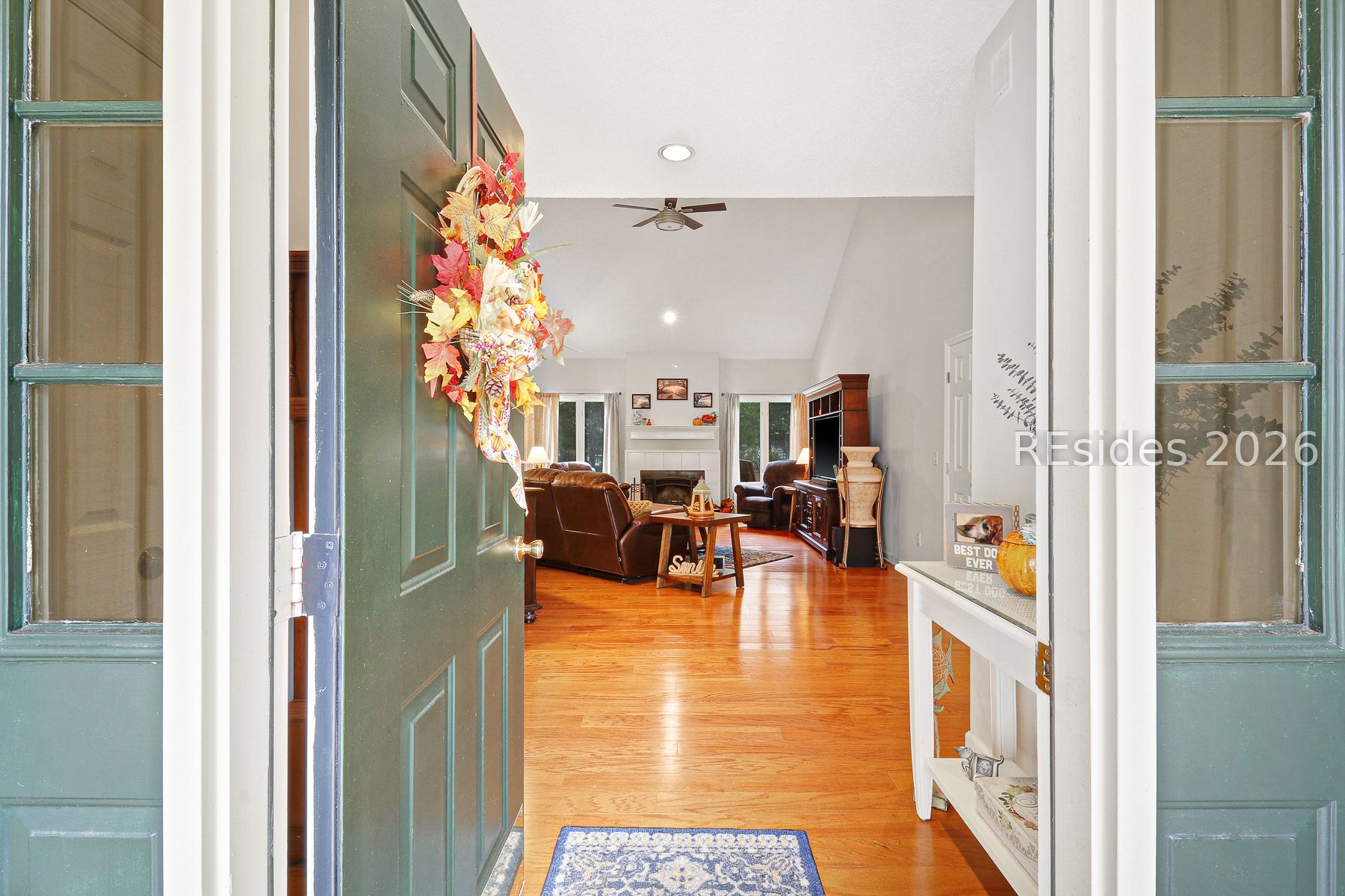 3 Crabtree Lane Bluffton, SC 29910 - Photo 3 of 56 Warm wood floors open to great room.