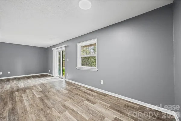 a kitchen with cabinets appliances a sink and a stove