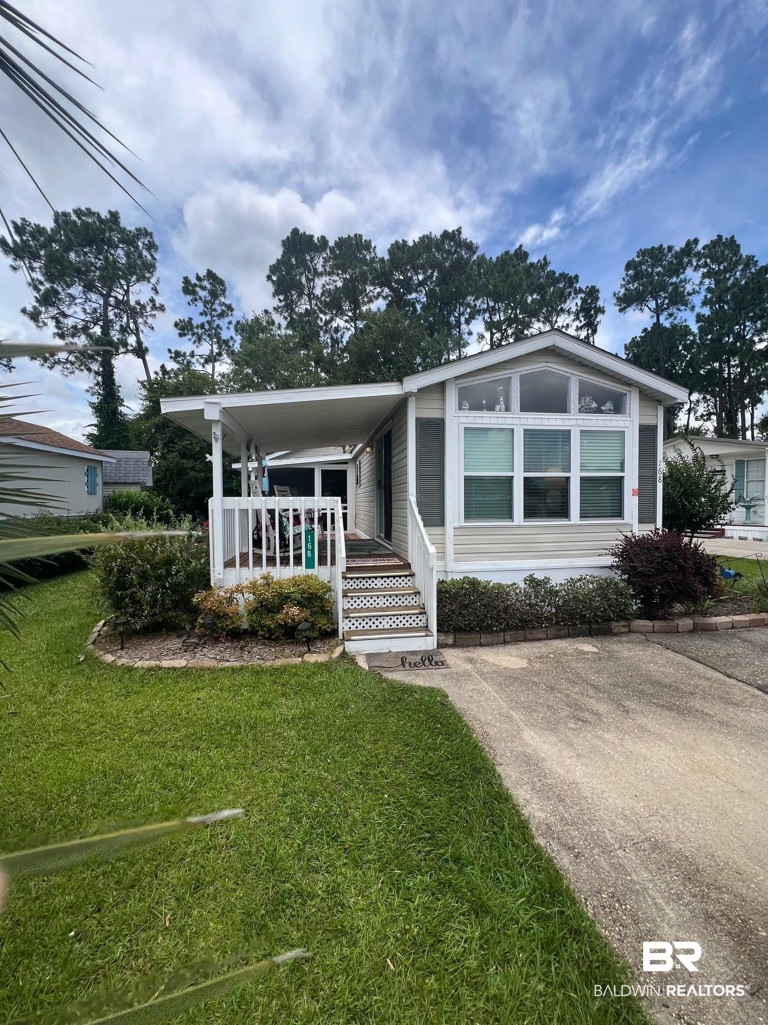 168 Defuniak Loop Lillian, AL 36549 - Photo 1 of 28 Manufactured / mobile home featuring a front yard