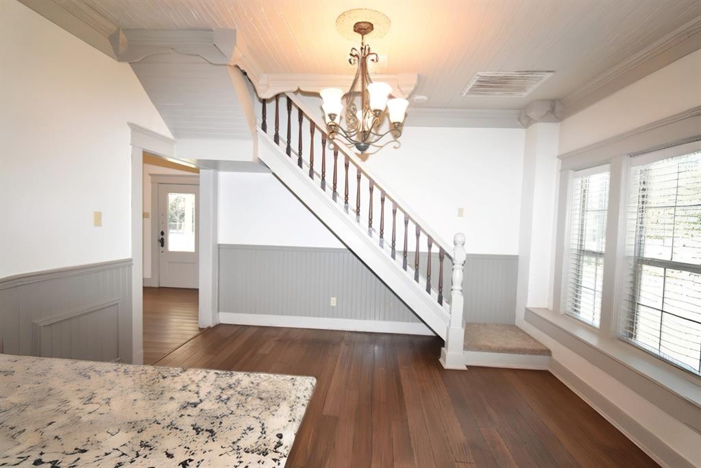 269 Holley Street Alba, TX 75410 - Photo 14 of 37 a view of entryway and hall with wooden floor