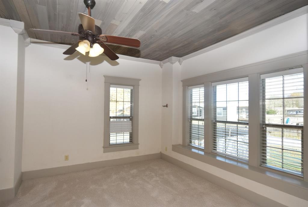 269 Holley Street Alba, TX 75410 - Photo 21 of 37 a view of an empty room with a window