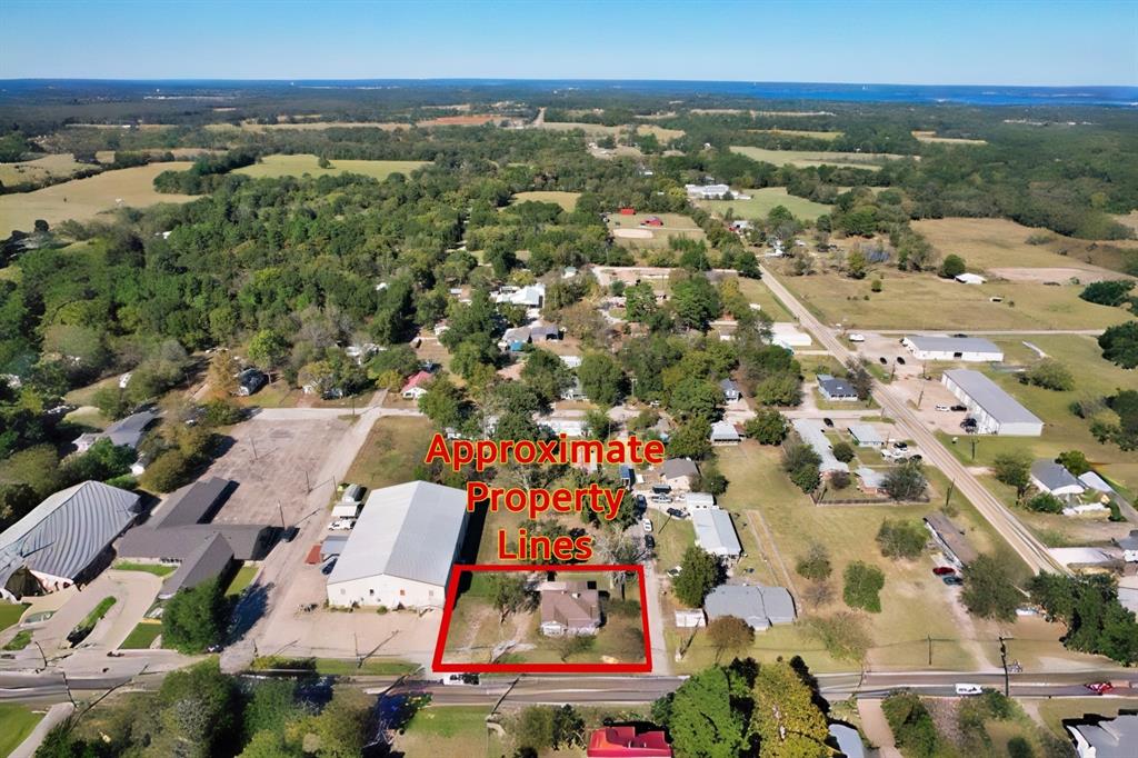 269 Holley Street Alba, TX 75410 - Photo 35 of 37 an aerial view of residential houses with outdoor space