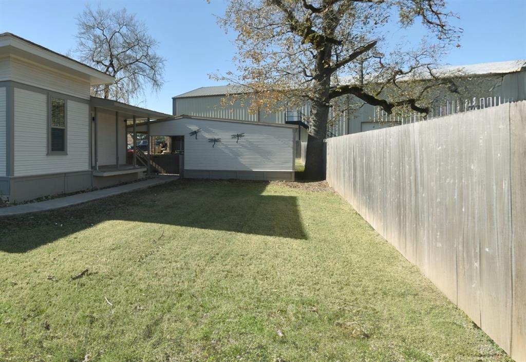 269 Holley Street Alba, TX 75410 - Photo 9 of 37 a view of a back yard of the house