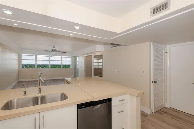 an empty room with wooden floor