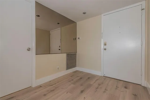 a bathroom with a sink toilet and mirror
