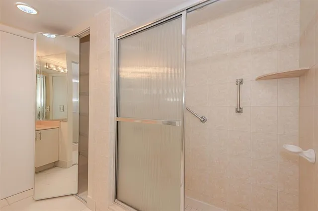 a view of a balcony with furniture