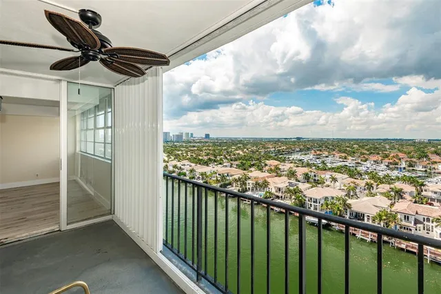 an aerial view of residential building with outdoor space and swimming pool
